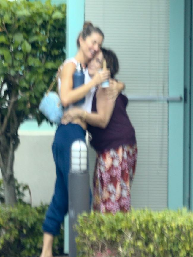 Gisele Bündchen is all smiles for the first time in a long time as she visits a holistic healer in Florida.