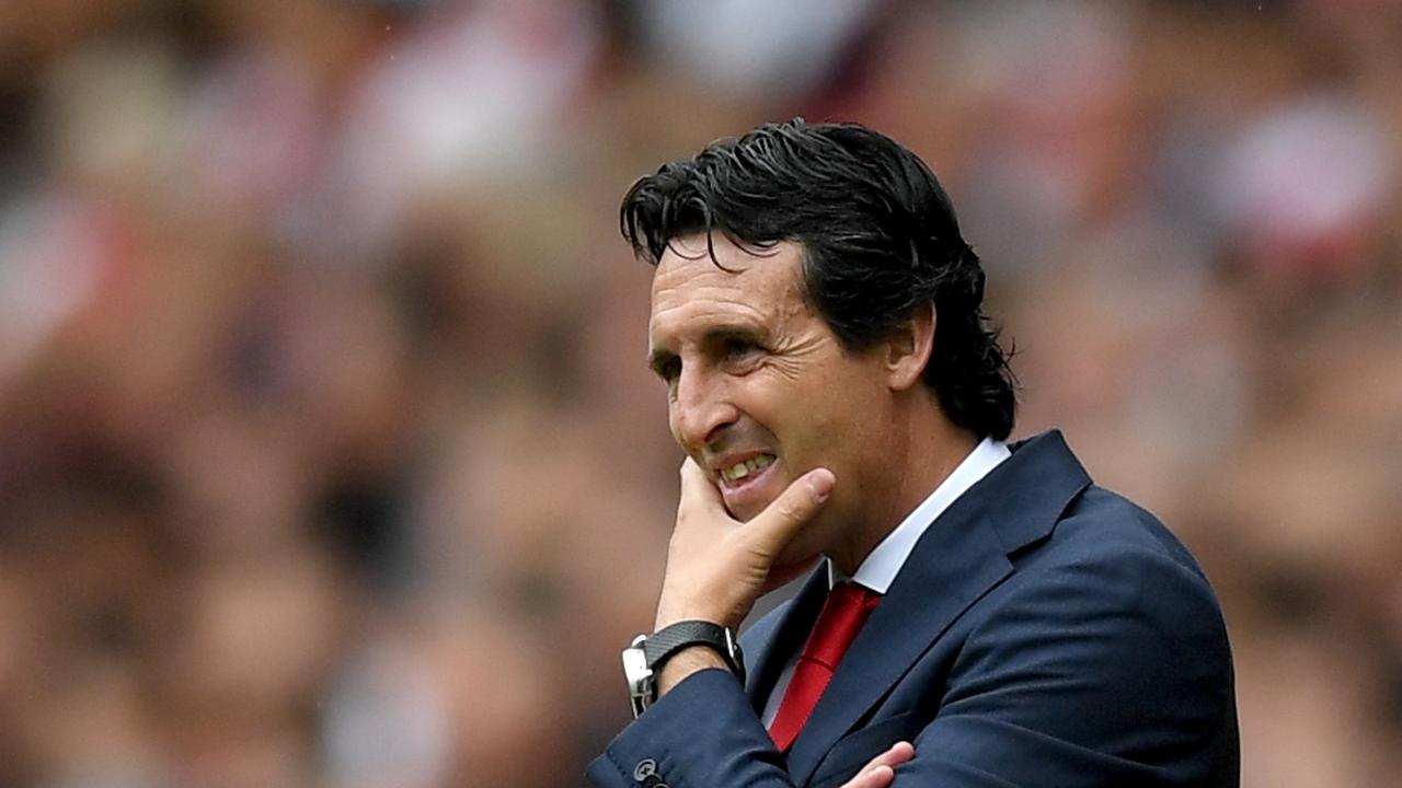 Unai Emery, Manager of Arsenal looks on