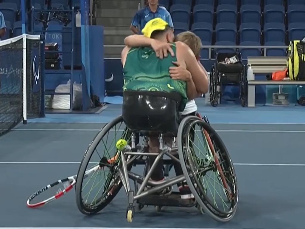 Dylan Alcott and Niels Vink embrace. Photo: Channel 7.