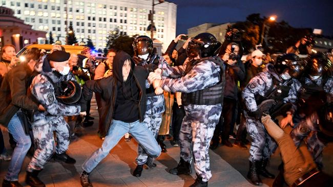 Police officers detain a man in Moscow in protests against partial mobilisation. Picture: AFP