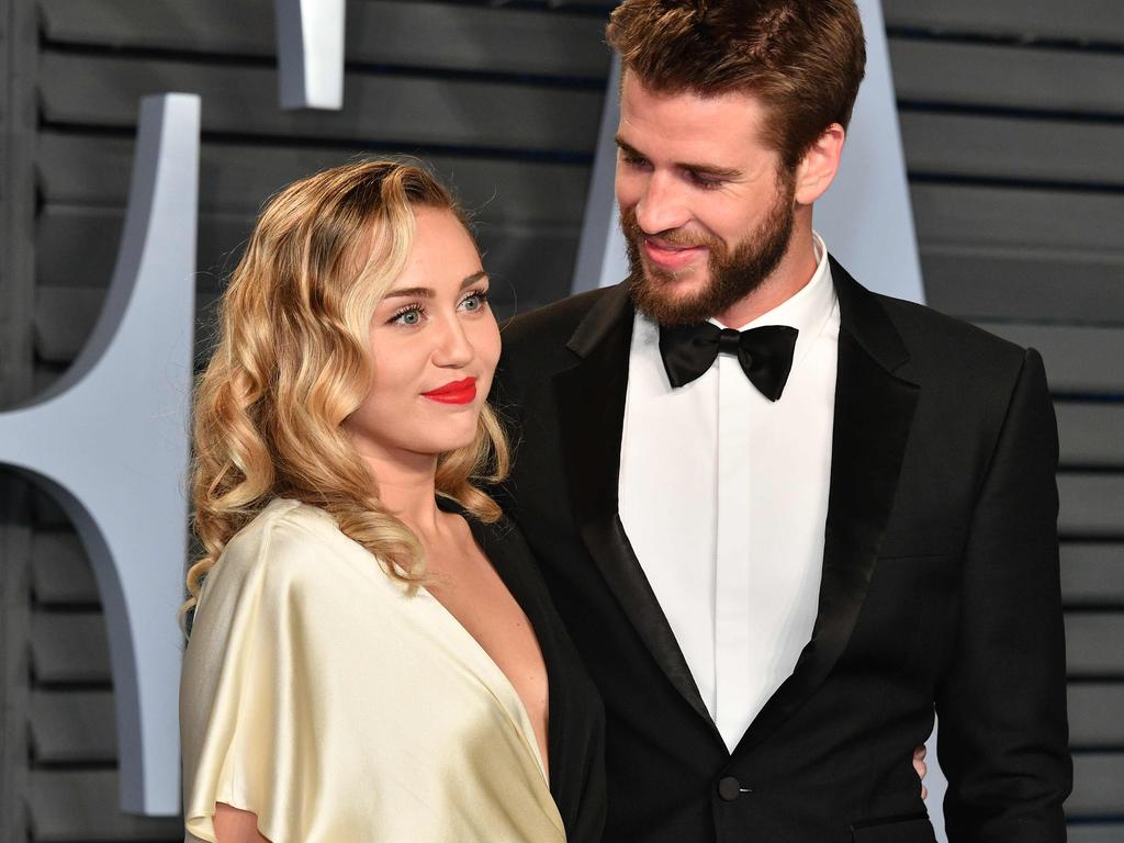 Happier days for Liam Hemsworth and Miley Cyrus at the 2019 Vanity Fair Oscars Party. Picture: Getty Images/AFP