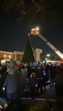 A man dressed as Santa Claus led the town’s Christmas tree lighting in Smyrna, Georgia, from the top of a firefighting truck ladder on November 30. This video posted to Facebook by the City of Smyrna shows the moment the tree’s lights are turned on after a countdown. Credit: City of Smyrna via Storyful