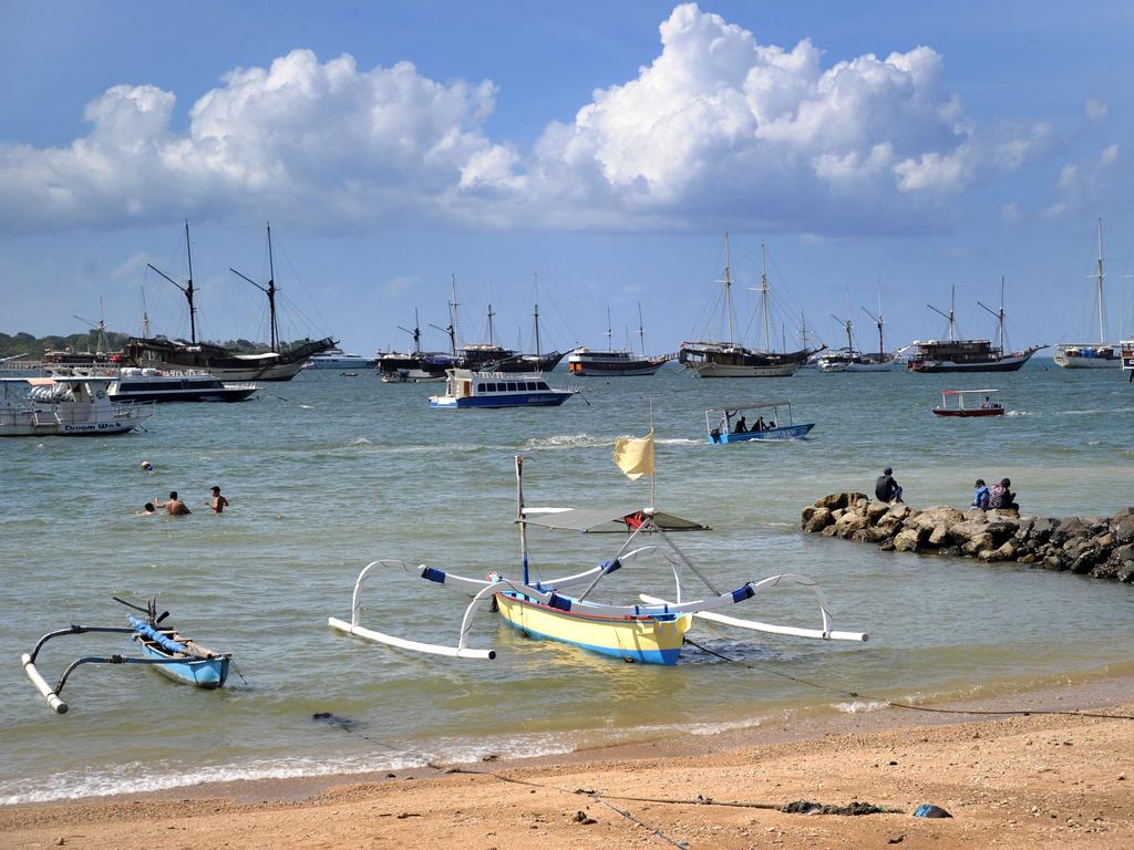 Tourist boats are moored at Serangan island port after new measures were enforced to curb the spread of Covid-19 on Indonesia's resort island of Bali. Picture: Sonny Tumbelaka.