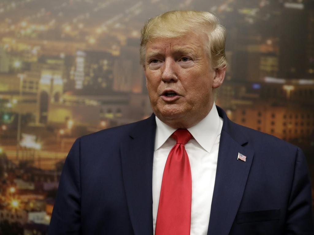 President Donald Trump speaks to the media as he visits the El Paso Regional Communications Center after meeting with victims. Picture: AP