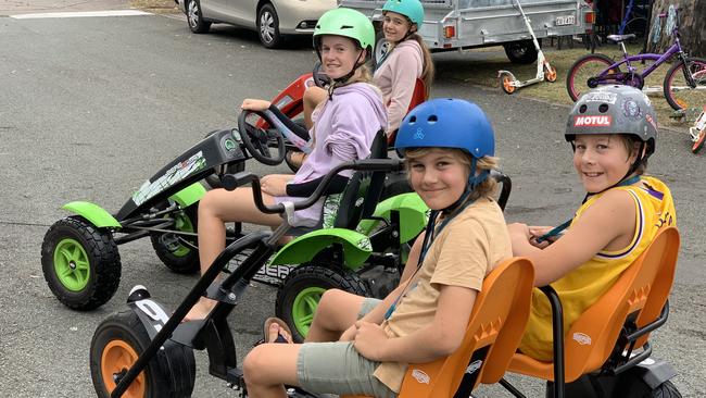 Kids enjoying go karts at NRMA Treasure Island Holiday Resort.