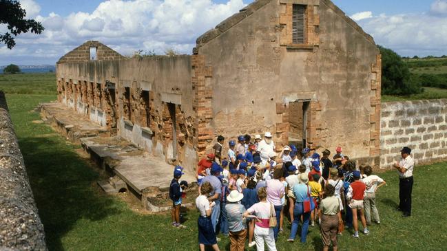 Day trippers explore the old convict settlement on St Helena Island. Picture: News Corp Australia