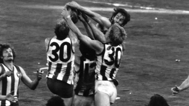 Ross “Twiggy” Dunne takes a remarkable grab and kicks the goal to draw the 1977 Grand Final.