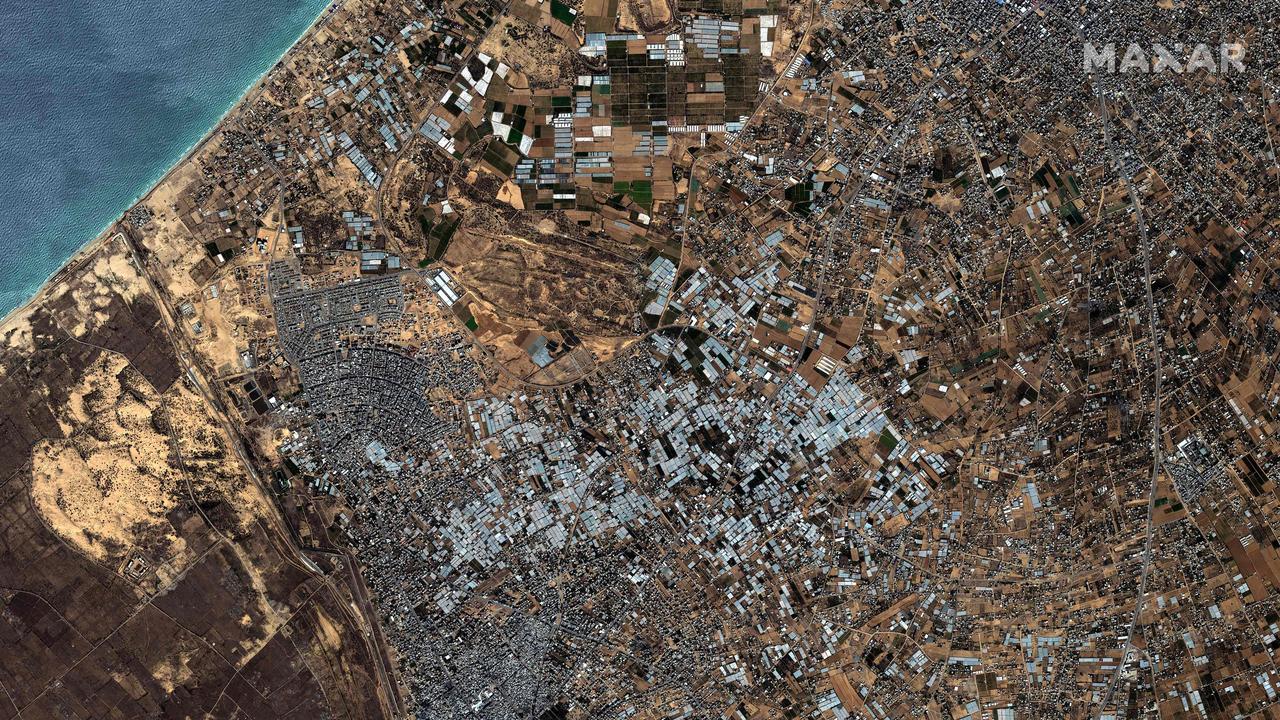 A satellite image provided by Maxar Technologies shows an overview of Rafah border crossing to Egypt as thousands massed.