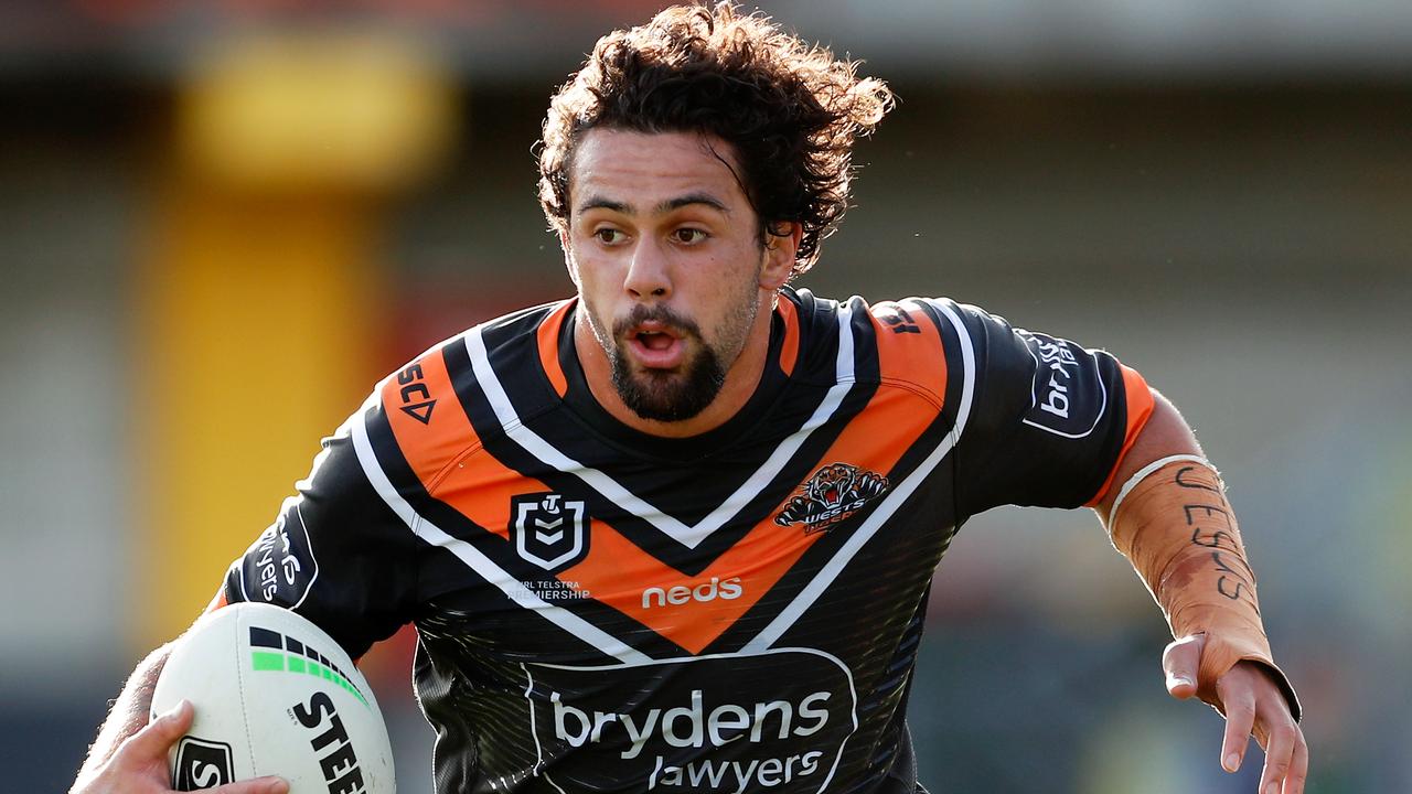 Josh Aloiai of the Tigers runs the ball during the Round 2 NRL match between the Wests Tigers and the Newcastle Knights a Leichhardt Oval in Sydney, Wednesday, May 1, 2019. (AAP Image/Brendon Thorne) NO ARCHIVING, EDITORIAL USE ONLY