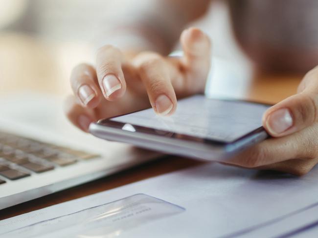 Close up of a woman using a phone