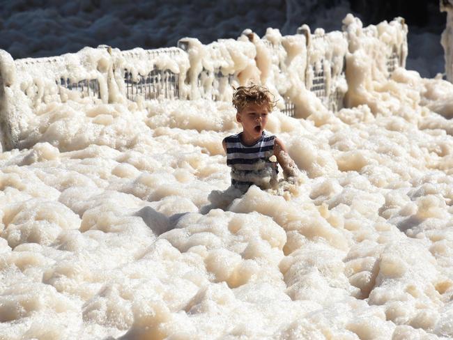 Surf and foam around Currumbin Vikings Surf Club on the Gold Coast as wild weather battered the east coast this week. Picture: NCA NewsWire / Steve Holland