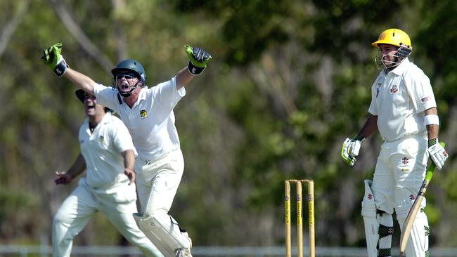 Simon Lavers and keeper Martin Brown celebrate the wicket of Tracey Village's Darren Treumer. Picture: Justin Sanson