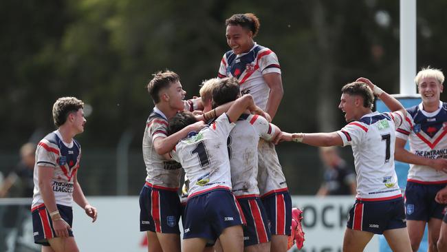 The Roosters celebrate their victory. Picture: Sue Graham