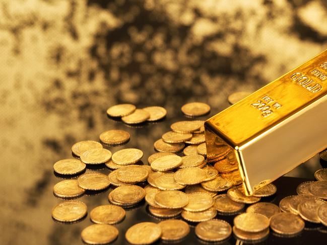 Gold bars and gold coins for wealth