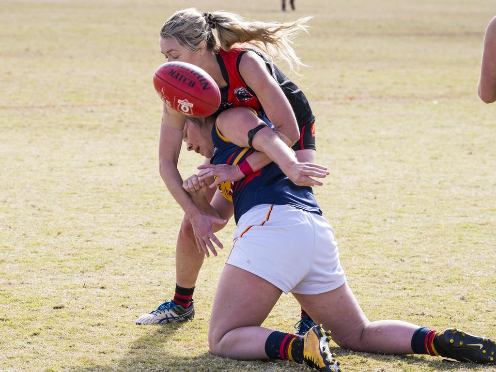 South Toowoomba player Stephanie Sanchez (back) and Nicole Mairs of University in AFL Darling Downs senior women's round 9 at Heritage Oval, Saturday, June 19, 2021. Picture: Kevin Farmer