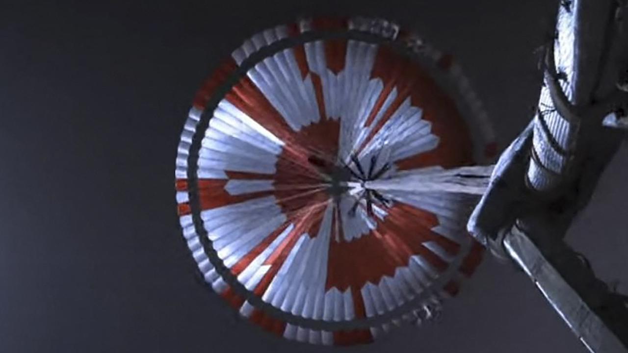 A still from NASA video showing the parachute helping Perseverance land on February 18. Picture: AFP/NASA/JPL-Caltech