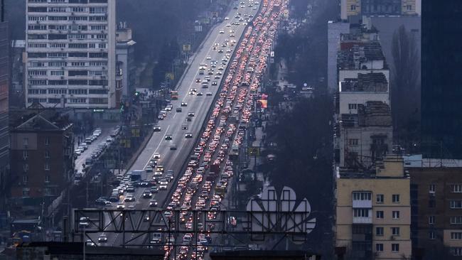 Inhabitants of Kyiv leave the city following pre-offensive missile strikes. Picture: Pierre Crom/Getty Images