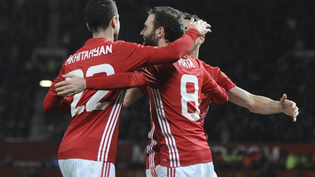 Manchester United's Juan Mata celebrates after scoring against Hull.