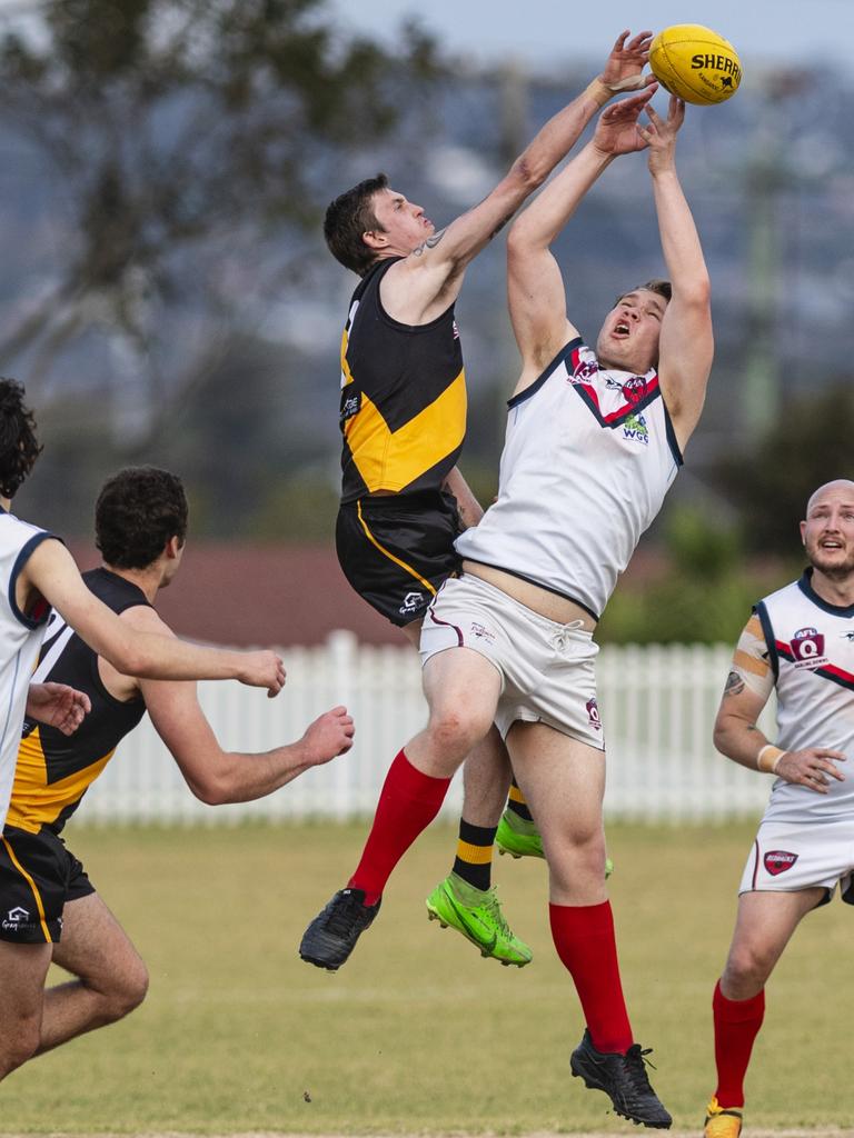 Bailey Glasscock (left) of Toowoomba Tigers and Erik McConnell of Warwick Redbacks compete for the ball. Picture: Kevin Farmer