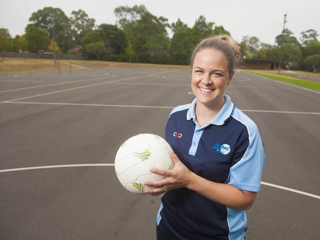 Briony Akle, coach of Baulkham Hills state netball side and former Swifts premiership player, was appointed as an apprentice coach for the NSW Swifts. Pic of her in NSW Swifts gear.