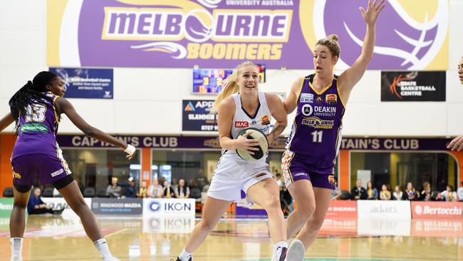 Adelaide Lightning captain Nicole Seekamp drives to the basket against the Melbourne Boomers at State Basketball Centre in Victoria. Picture: Lawrence Pinder