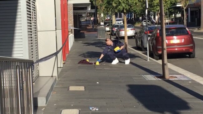 Police canvassed the scene for evidence the following morning.