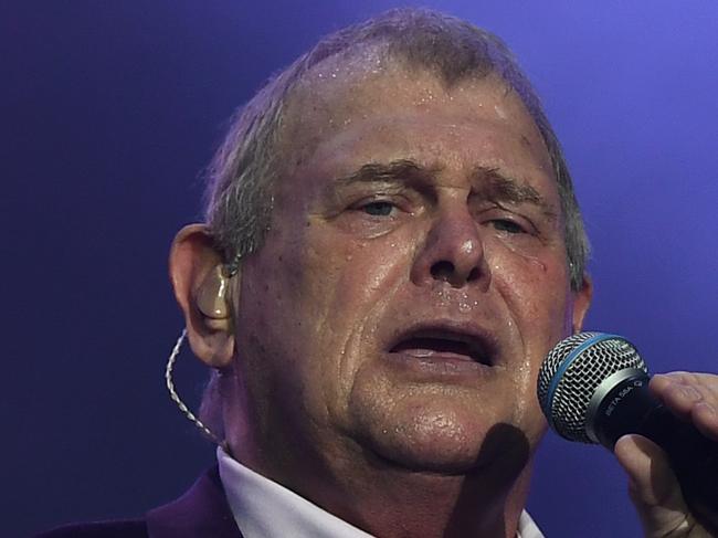 John Farnham performs during the Fire Fight Australia bushfire relief concert at ANZ Stadium in Sydney, Sunday, February 16, 2020. (AAP Image/Joel Carrett) NO ARCHIVING