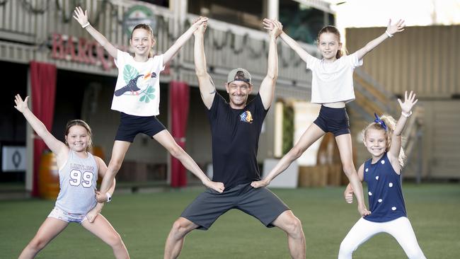 Milli Mansbridge, 8, Ella Lindeberg, 8, instructor Neal Webb, Sophie Lindeberg, 8, and Billie Frampton, 7, showing off what they have learned. Photo: Tim Marsden