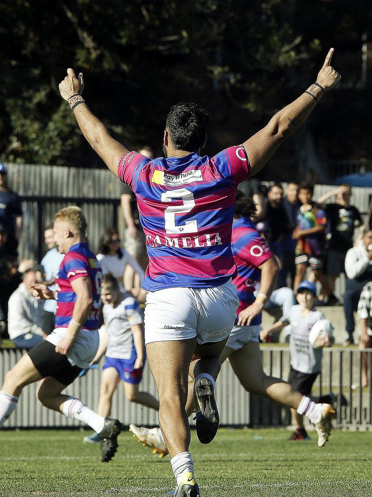 Alexandria Rovers' Athol Williams raises his hands after the try that would clench the victory for Alexandria. Picture: John Appleyard