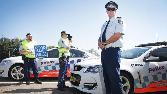 Central Metropolitan Highway Patrol Chief Inspector Paul Fownes with Botany Bay Highway Patrol officers Senior Constables Douglas Leef and Piyalak Amornyard on the job at Foreshore Drive, Botany.