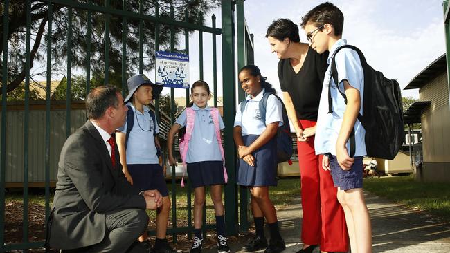 Shadow education minister Jihad Dib, Burwood Public school Students Eddy Bock, Hermoine Dossantos and Nimisha Sudhakar with Strathfield MP Jodi McKay. Pictures: John Appleyard