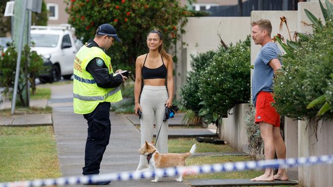 Police spoke with nearby residents as they investigate a suspected hit and run. Picture: Max Mason-Hubers