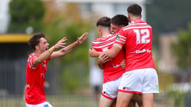 Dragons celebrate a try in the Laurie Daley SLE Cup Grand Final. Picture: Sue Graham