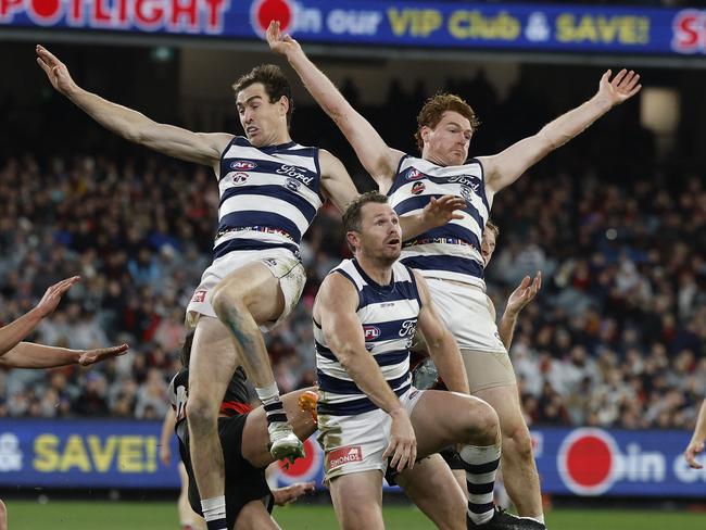 MELBOURNE, AUSTRALIAÃ&#137; June 29, 2024. AFL Round 16. Geelong vs. Essendon at the MCG. Patrick Dangerfield, Gary Rohan and Jeremy Cameron of the Cats all fly for the mark during the 3rd qtr. . Pic: Michael Klein