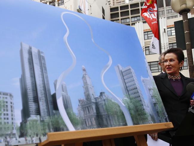 Clover Moore with an artist’s impression of Cloud Arch, a 50 metre cloud shaped public art work that is to be built in George street. Picture: David Moir