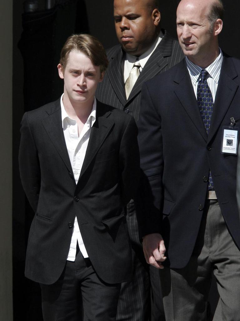 Macaulay Culkin leaves court.