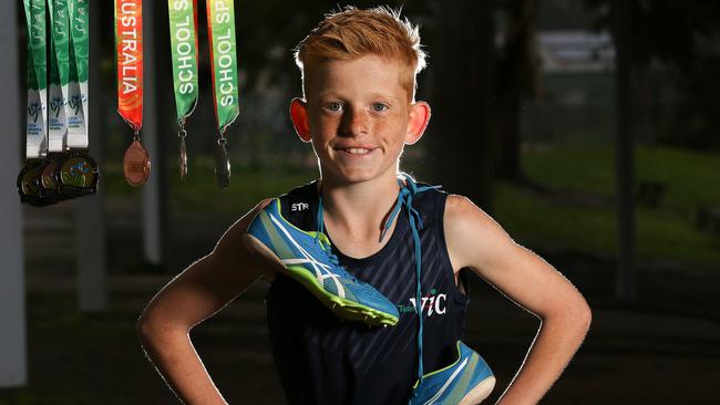 Chas Woodward has set Victorian records in hurdles and long jump and made the SSV U12 footy team. Chas August 28th, Greensborough, Melbourne.Picture : George Salpigtidis