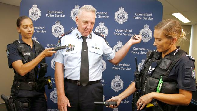 Assistant commissioner Brian Wilkins with constable Brianna Biles, left, and senior constable Jacqui Hunt, right, demonstrate how wanding will work. Picture: Tertius Pickard