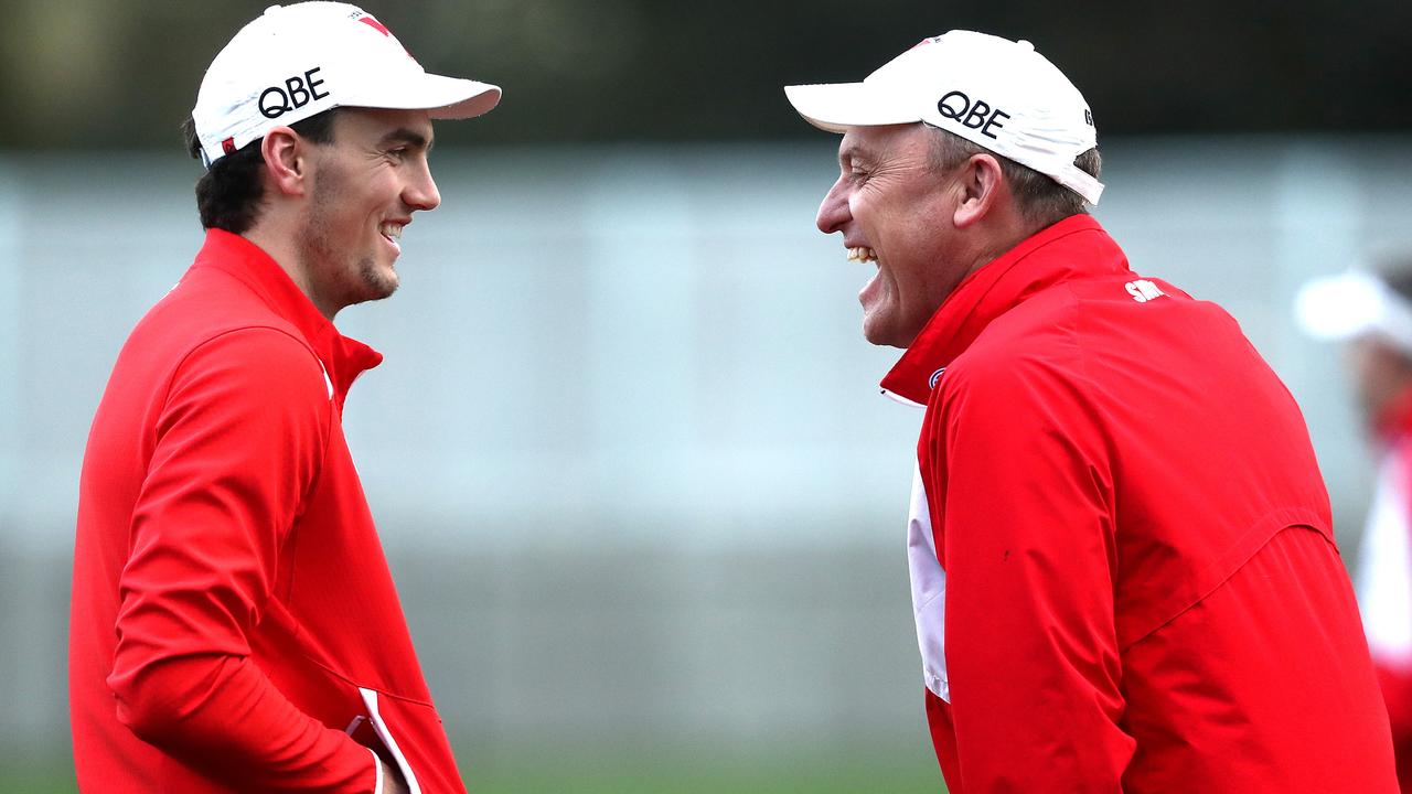 Swans coach John Longmire enjoys a laugh with young forward Tom McCartin. Picture: Phil Hillyard