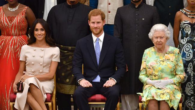 Meghan, Prince Harry, and the Queen. Picture: AFP