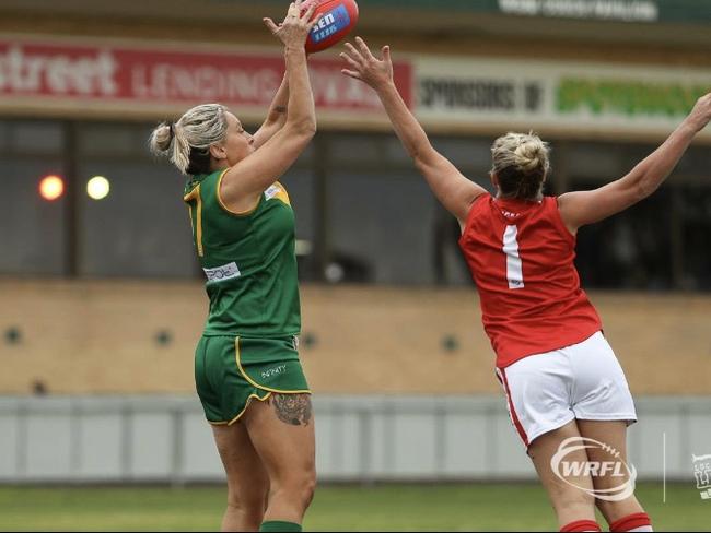 Hayley Cooney takes a grab while playing for Spotswood. Picture: Local Legends