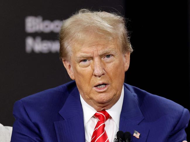 TOPSHOT - Former US President and Republican presidential candidate Donald Trump speaks during an interview with Bloomberg Editor-in-Chief John Micklethwait at the Economic Club of Chicago, in Chicago, Illinois, on October 15, 2024. (Photo by KAMIL KRZACZYNSKI / AFP)