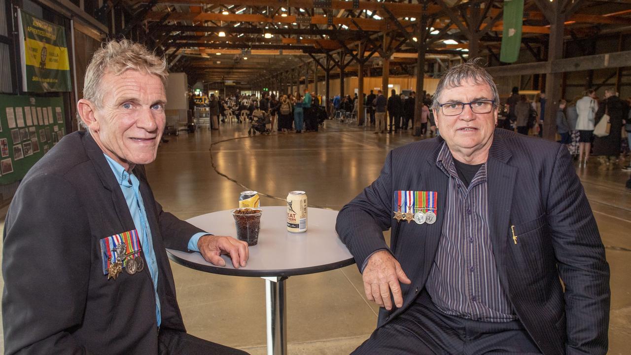 Scott and Russel Catton wore their fathers medals. Roy Samuel Catton's service took in D Day, Sicily and Tonga. Gunfire breakfast at The Goods Shed on ANZAC Day. Tuesday, April 25, 2023. Picture: Nev Madsen.