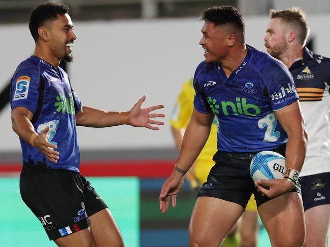 Caleb Clarke celebrates his try with Stephen Perofeta for the Blues. Picture: Michael Bradley / AFP