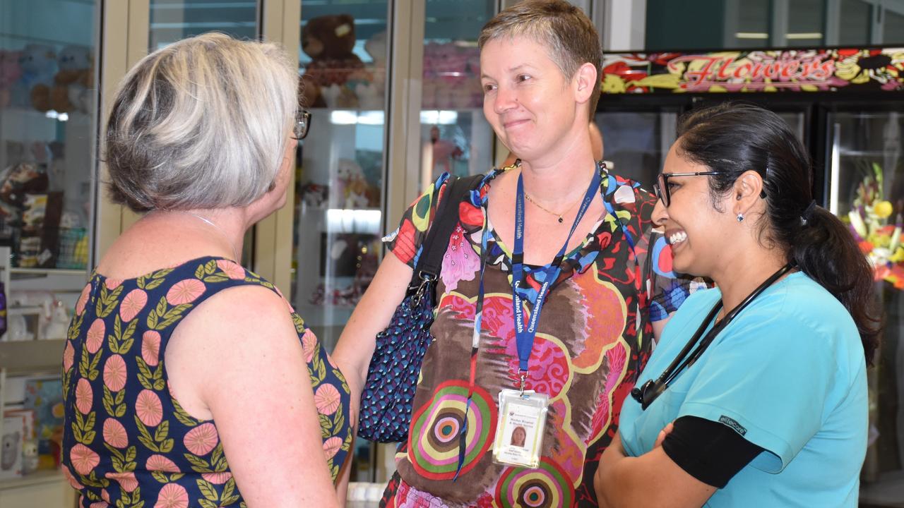 Shark attack survivor Justine Barwick speaks with Mackay Base Hospital's Dr Wendela Schimmer and Dr Tina Moriaty, who were among the team involved in saving her life and leg.