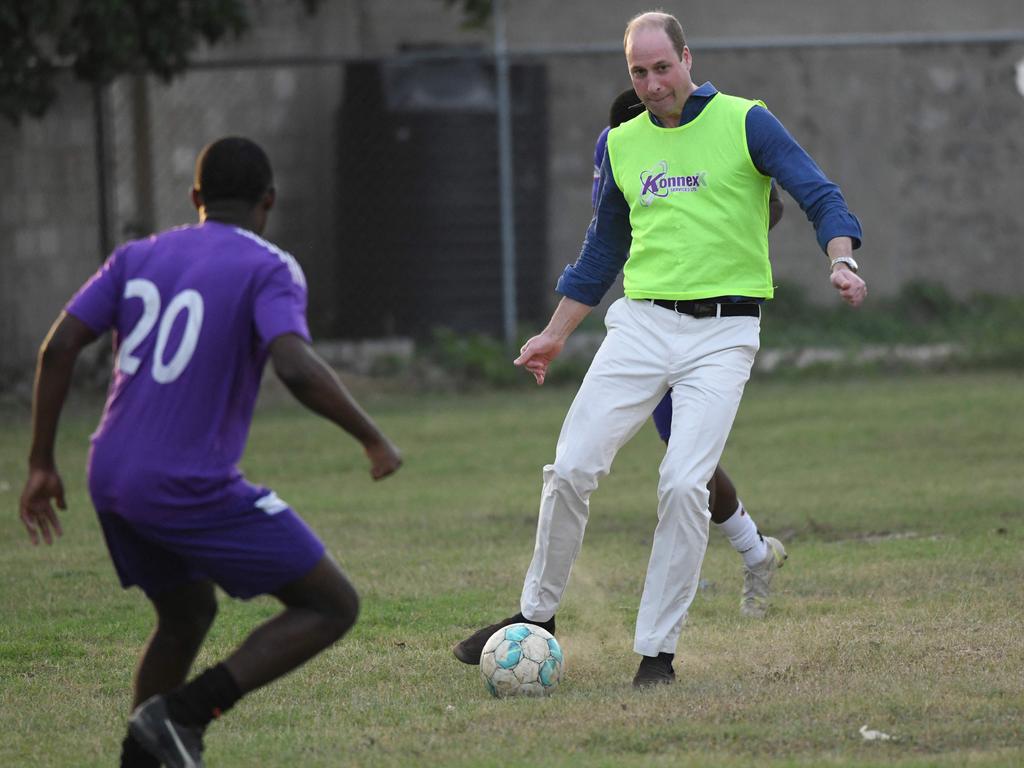 Prince William plays soccer in Kingston. Picture: AFP