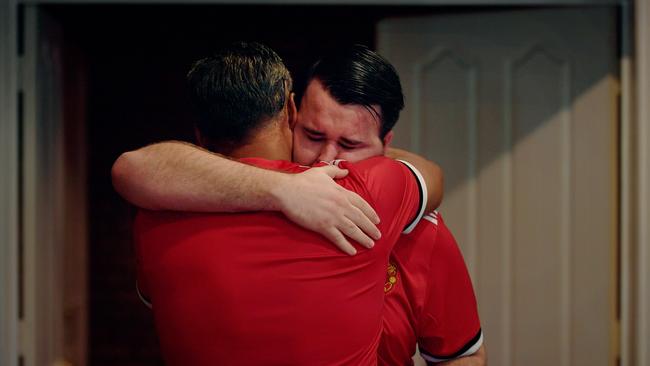 Carl Delaney’s son Dominic (facing camera) at his father’s funeral in Darwin on Friday. Picture: MICHAEL FRANCHI