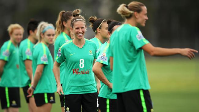 Elise Kellond-Knight shares a laugh with her teammates at Matildas training.