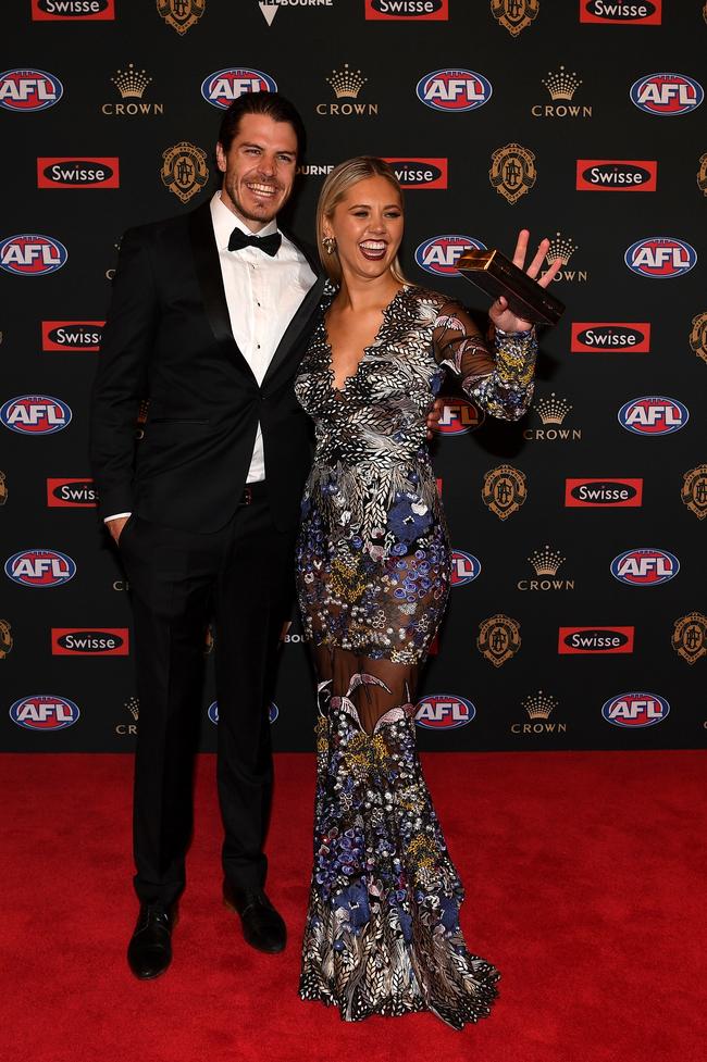 Isaac Smith of Hawthorn and partner Candice Quinlan. Picture: AAP