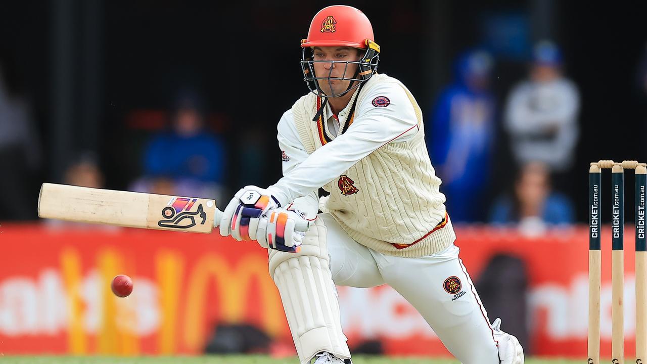 Carey reverse sweeps Tanveer Sangha twice to the boundary on his way to a half-century (Photo by Mark Evans/Getty Images)